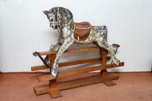 carved wooden rocking horse in dappled grey finish - CATEGORY: ANTIQUE MISCELLANEOUS - DATED 1920