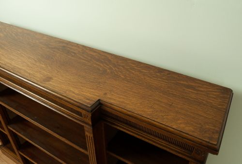 fig 3. A Victorian Oak Breakfront Open Bookcase, circa 1890.