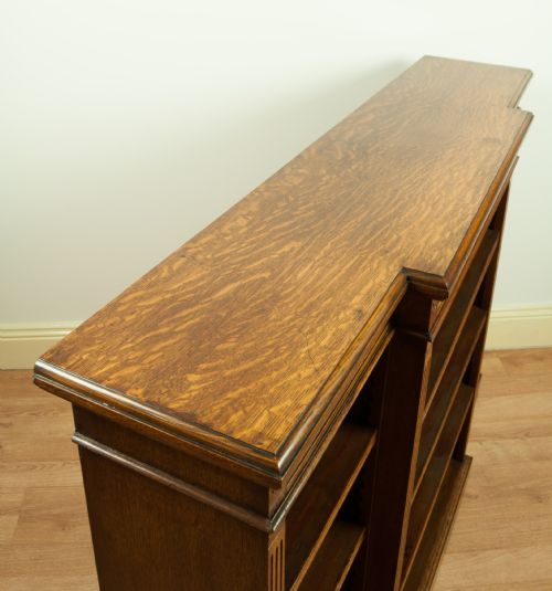 fig 4. A Victorian Oak Breakfront Open Bookcase, circa 1890.