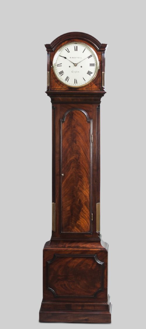 fig 1. A fine quality George III flame mahogany 8 day longcase/Grandfather clock by Handley & Moore of London, retailed by Restell of Croydon.