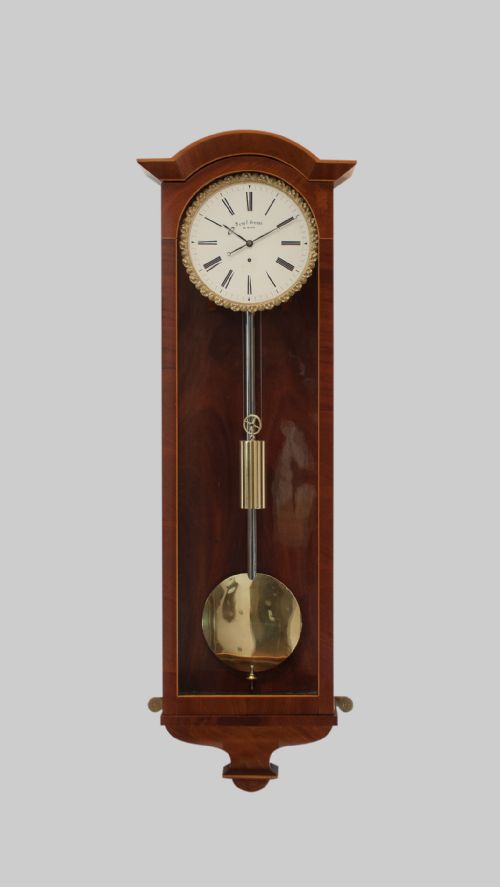 A Flame Mahogany Biedermeier Vienna Wall Regulator, Circa 1850
