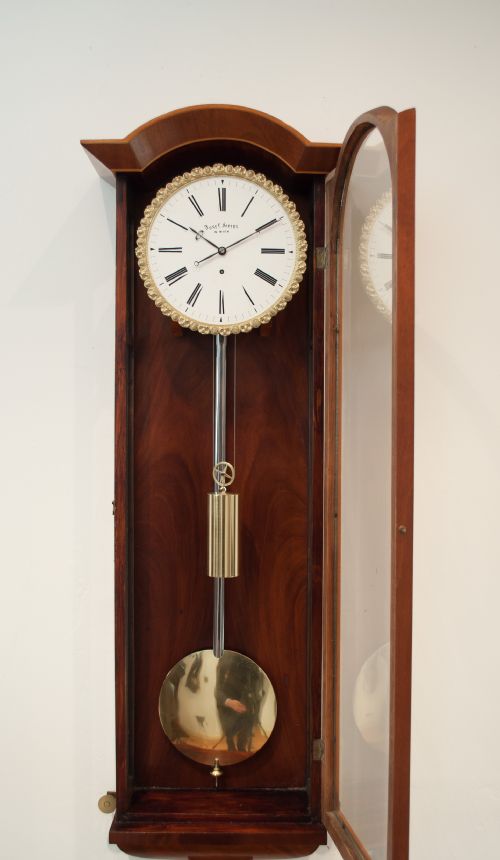 fig 2. A FLAME MAHOGANY BIEDERMEIER VIENNA WALL REGULATOR, CIRCA 1850