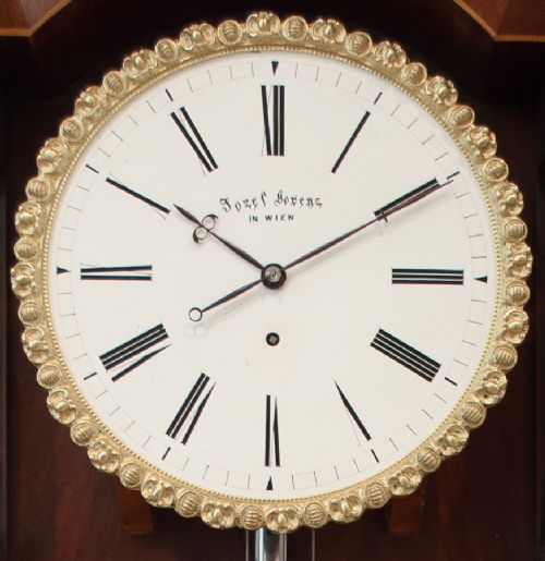 fig 3. A FLAME MAHOGANY BIEDERMEIER VIENNA WALL REGULATOR, CIRCA 1850