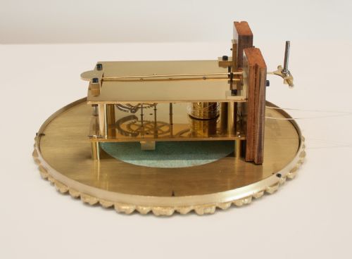 fig 5. A FLAME MAHOGANY BIEDERMEIER VIENNA WALL REGULATOR, CIRCA 1850