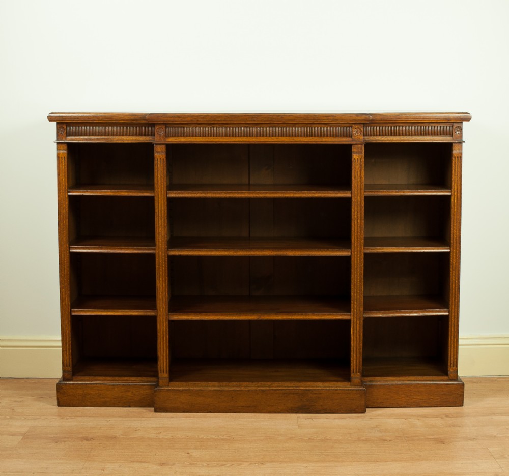 A Victorian Oak Breakfront Open Bookcase, circa 1890.