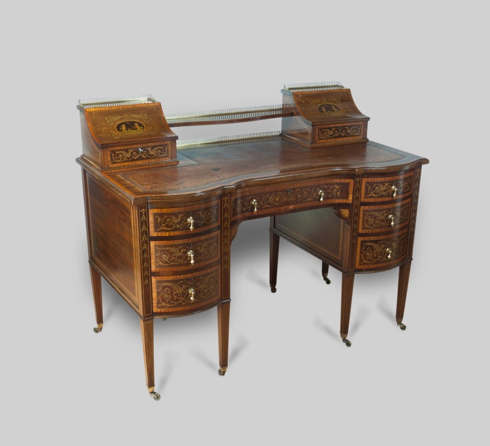 A FINE QUALITY MAHOGANY INLAID DESK BY EDWARDS & ROBERTS