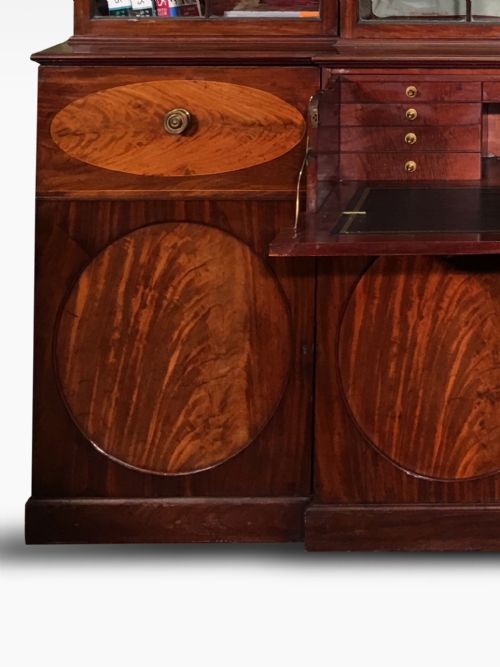 A SUPERB IMPORTANT GEORGE III MAHOGANY BREAKFRONT SECRETAIRE BOOKCASE OF MAGNIFICENT PROPORTIONS - ADDITIONAL PHOTO 1