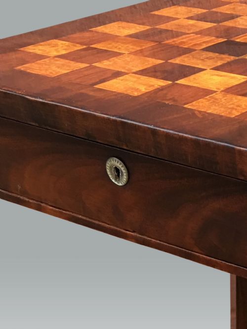 AN EARLY VICTORIAN MAHOGANY GAMES TABLE - ADDITIONAL PHOTO 1