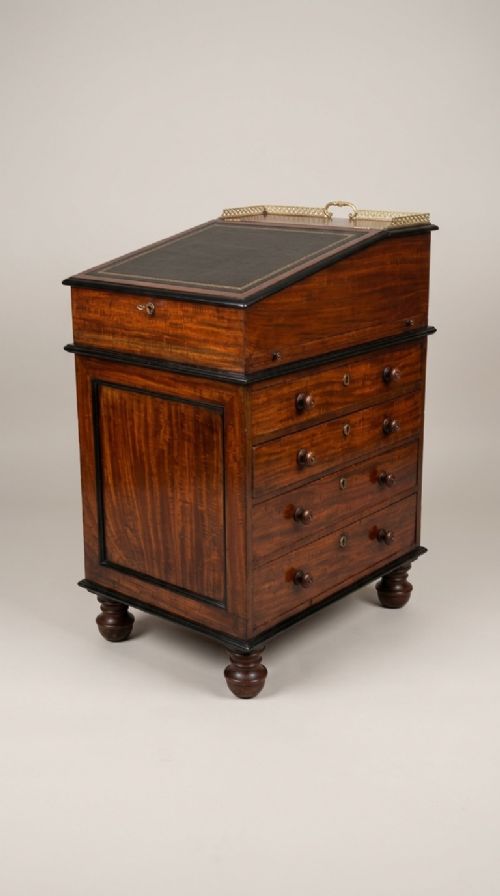 A GILLOWS MAHOGANY EBONISED DAVENPORT