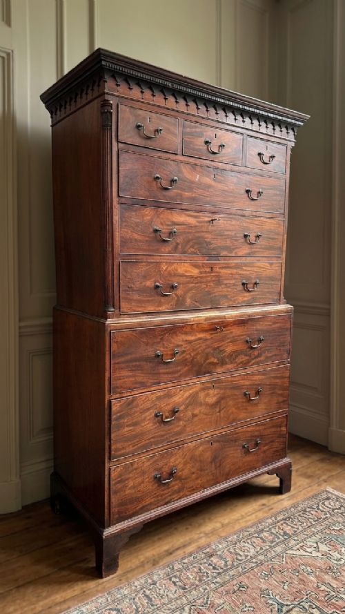 A Good George III Mahogany sectrataire chest on chest.