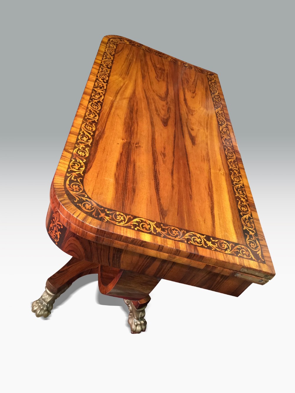 A SUPERB REGENCY GONCALO ALVES & HOLLY INLAID CARD TABLE IN THE MANNER OF GEORGE OAKLEY. View V