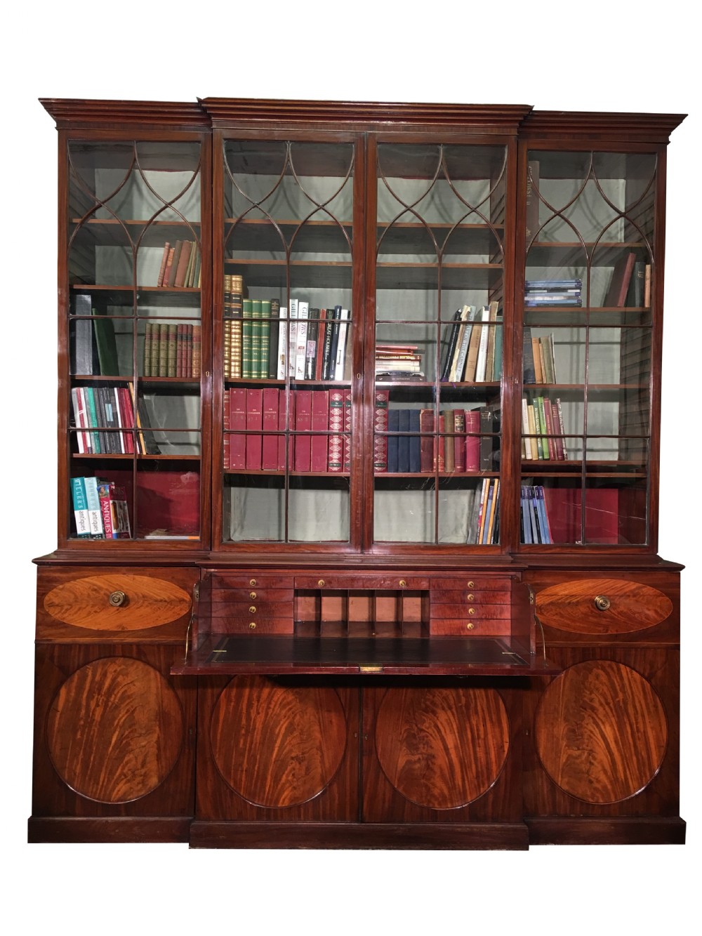 A SUPERB & IMPORTANT GEORGE III MAHOGANY BREAKFRONT SECRETAIRE BOOKCASE OF MAGNIFICENT PROPORTIONS.