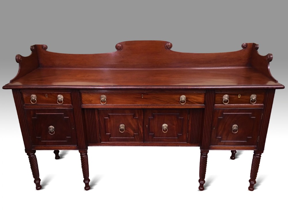A VERY FINE IRISH REGENCY MAHOGANY SIDEBOARD.