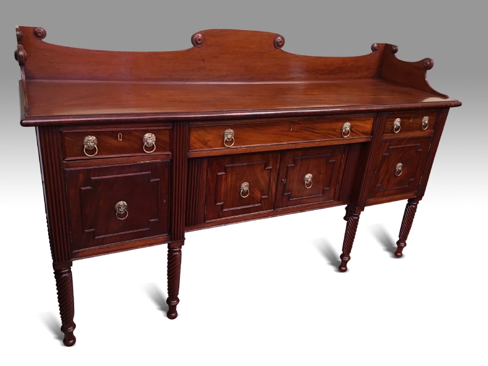A VERY FINE IRISH REGENCY MAHOGANY SIDEBOARD. View II
