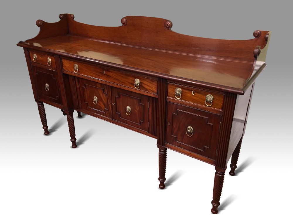 A VERY FINE IRISH REGENCY MAHOGANY SIDEBOARD. View III