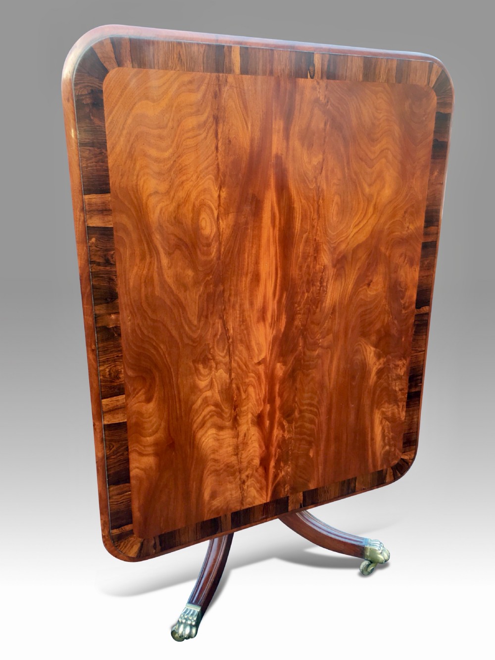 A GOOD LARGE REGENCY MAHOGANY & ROSEWOOD BREAKFAST OR DINING TABLE View III