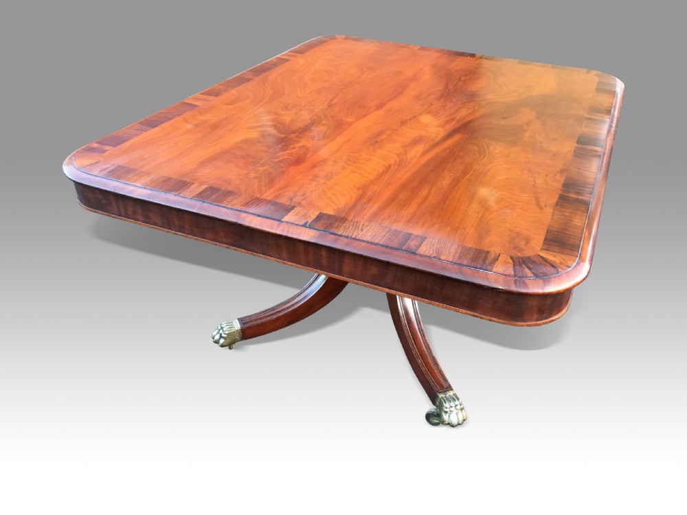 A GOOD LARGE REGENCY MAHOGANY & ROSEWOOD BREAKFAST OR DINING TABLE View IV