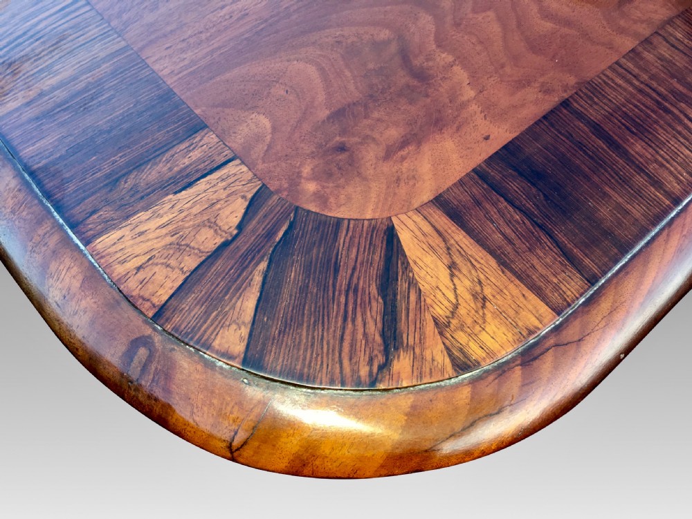 A GOOD LARGE REGENCY MAHOGANY & ROSEWOOD BREAKFAST OR DINING TABLE View V