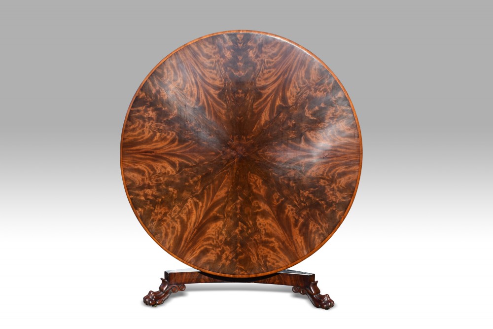 A SUPERB REGENCY MAHOGANY RADIAL VENEERED CENTRE TABLE. View II