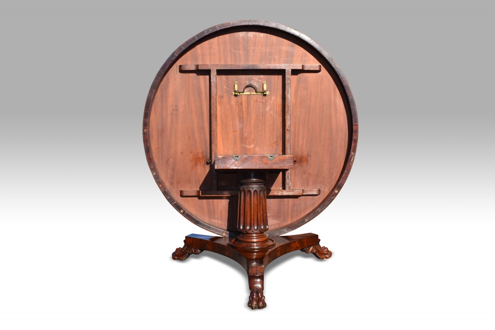 A SUPERB REGENCY MAHOGANY RADIAL VENEERED CENTRE TABLE. View IV