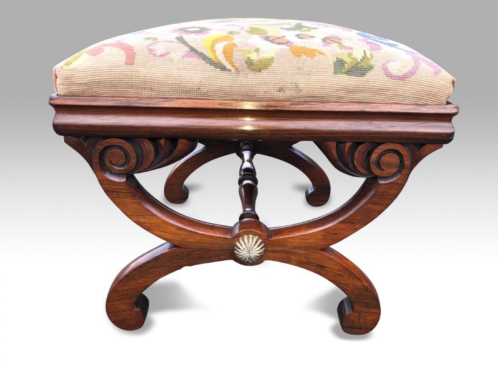 A FINE REGENCY ROSEWOOD X FRAMED STOOL.