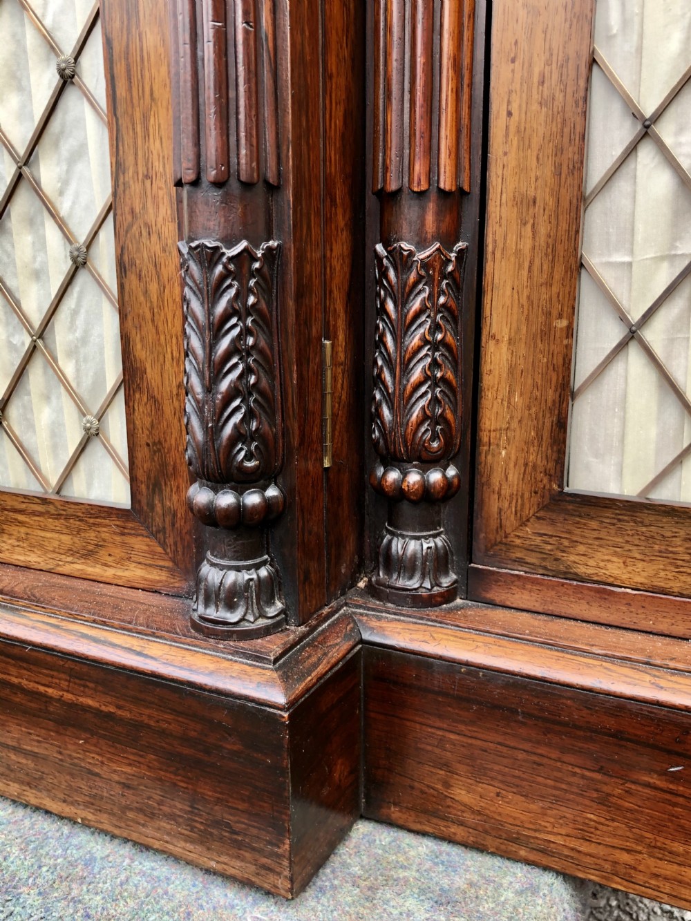 A MAGNIFICENT LATE REGENCY ROSEWOOD BREAKFRONT SIDE CABINET IN THE MANNER OF GILLOWS. View V