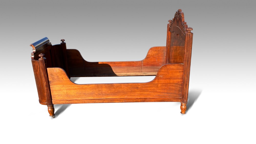 A MAGNIFICENT MID 19TH CENTURY MAHOGANY CHILDS BED. View II