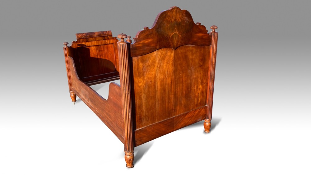 A MAGNIFICENT MID 19TH CENTURY MAHOGANY CHILDS BED. View V