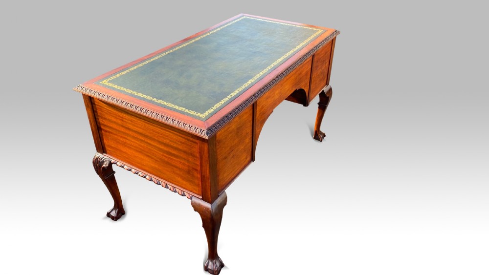 AN EDWARDIAN MAHOGANY KNEEHOLE DESK View III