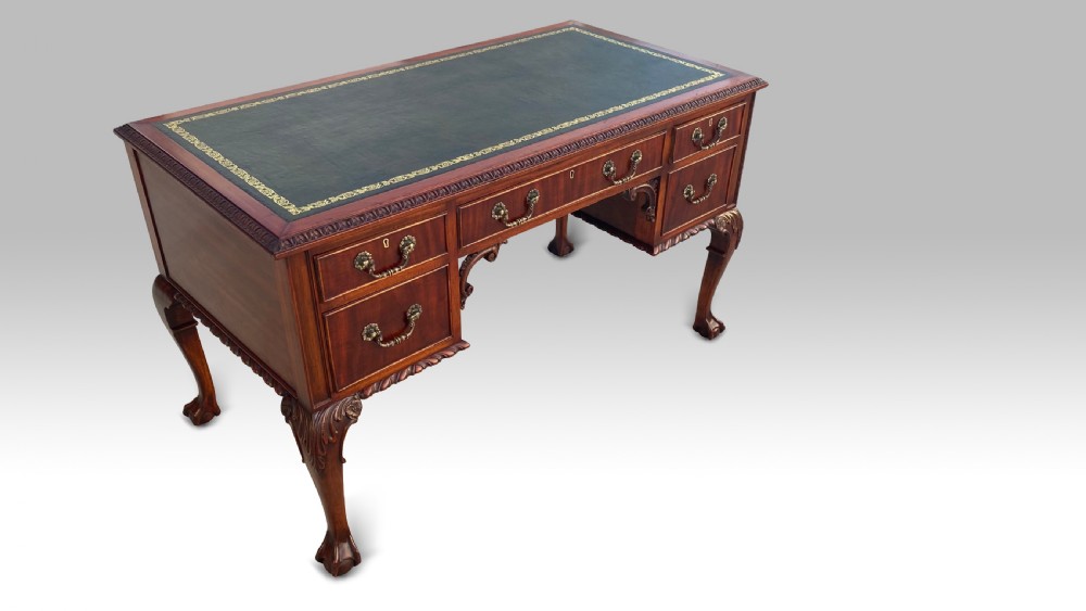 AN EDWARDIAN MAHOGANY KNEEHOLE DESK View V