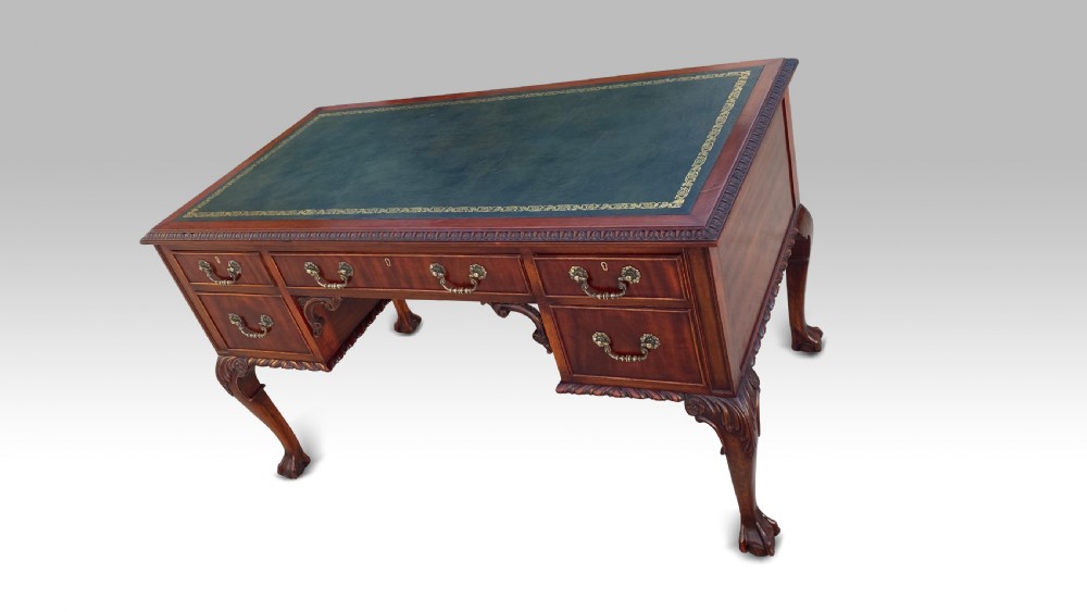 AN EDWARDIAN MAHOGANY KNEEHOLE DESK View VI