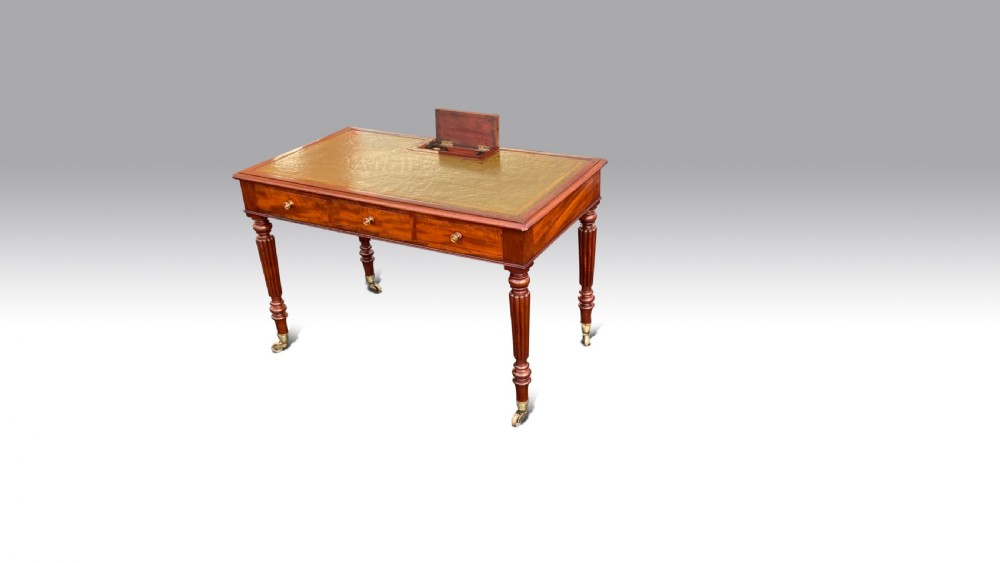 A REGENCY MAHOGANY CHAMBER WRITING TABLE BY GILLOWS View II