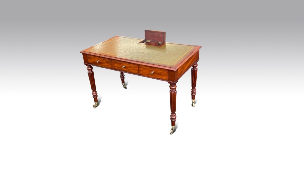 A REGENCY MAHOGANY CHAMBER WRITING TABLE BY GILLOWS View III