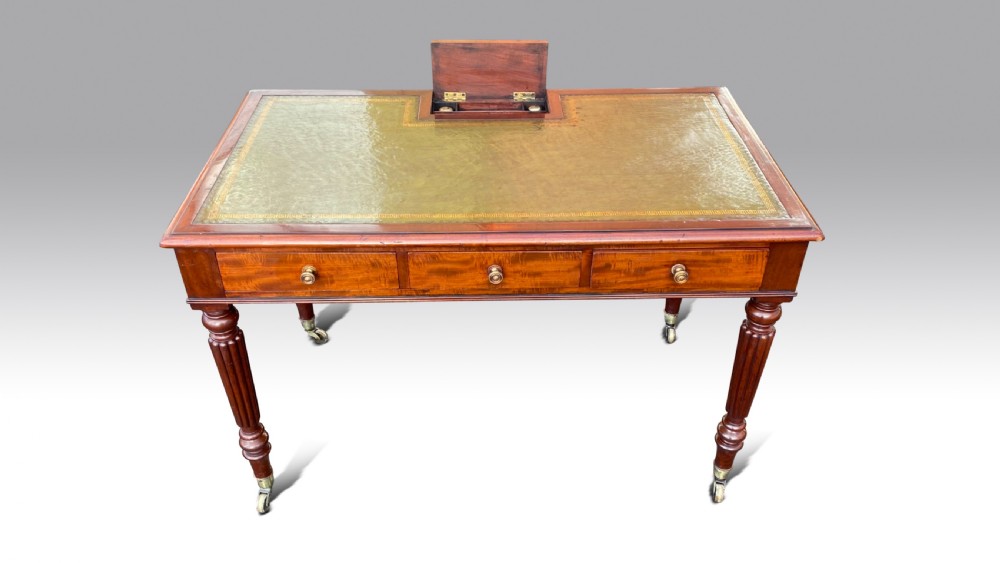A REGENCY MAHOGANY CHAMBER WRITING TABLE BY GILLOWS View V