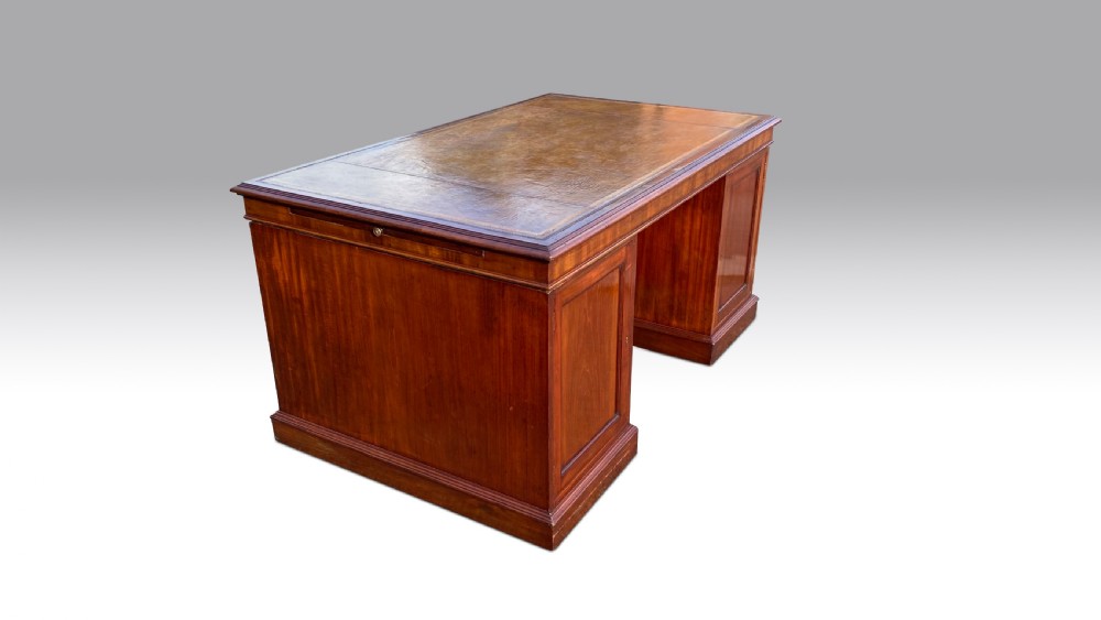 A wonderful quality mid 19th C mahogany partners desk. View VIII