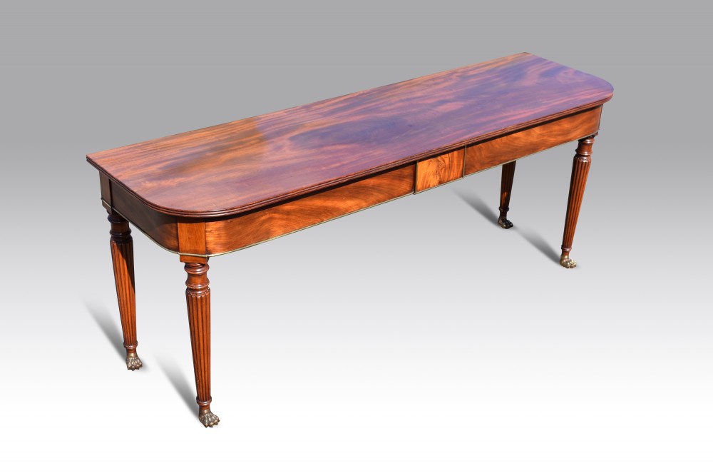 A FINE REGENCY MAHOGANY CONSOLE TABLE