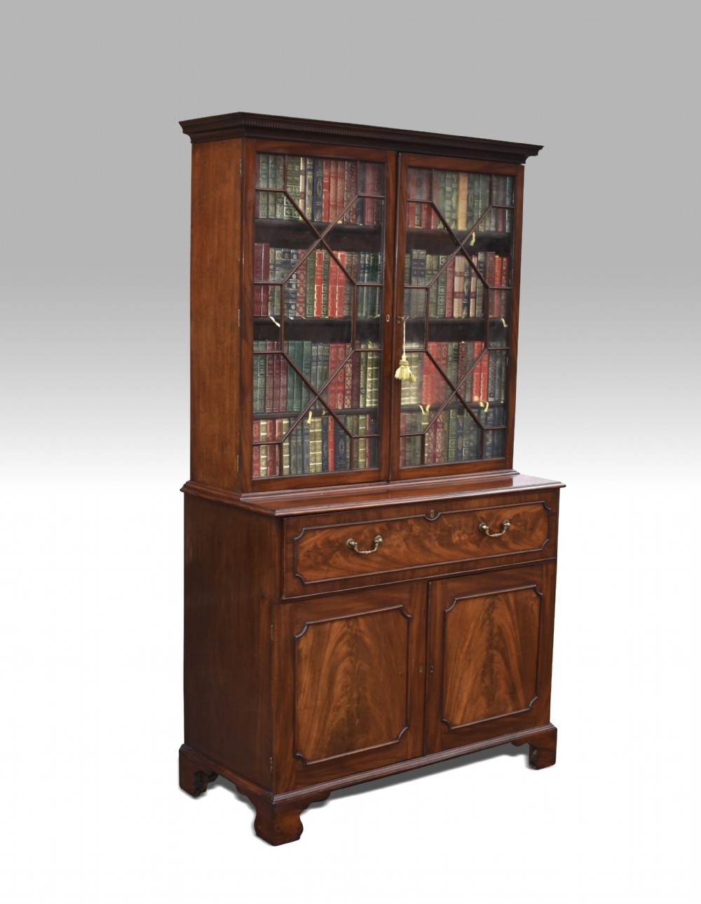 A FINE CHIPPENDALE PERIOD MAHOGANY SECRETAIRE BOOKCASE.