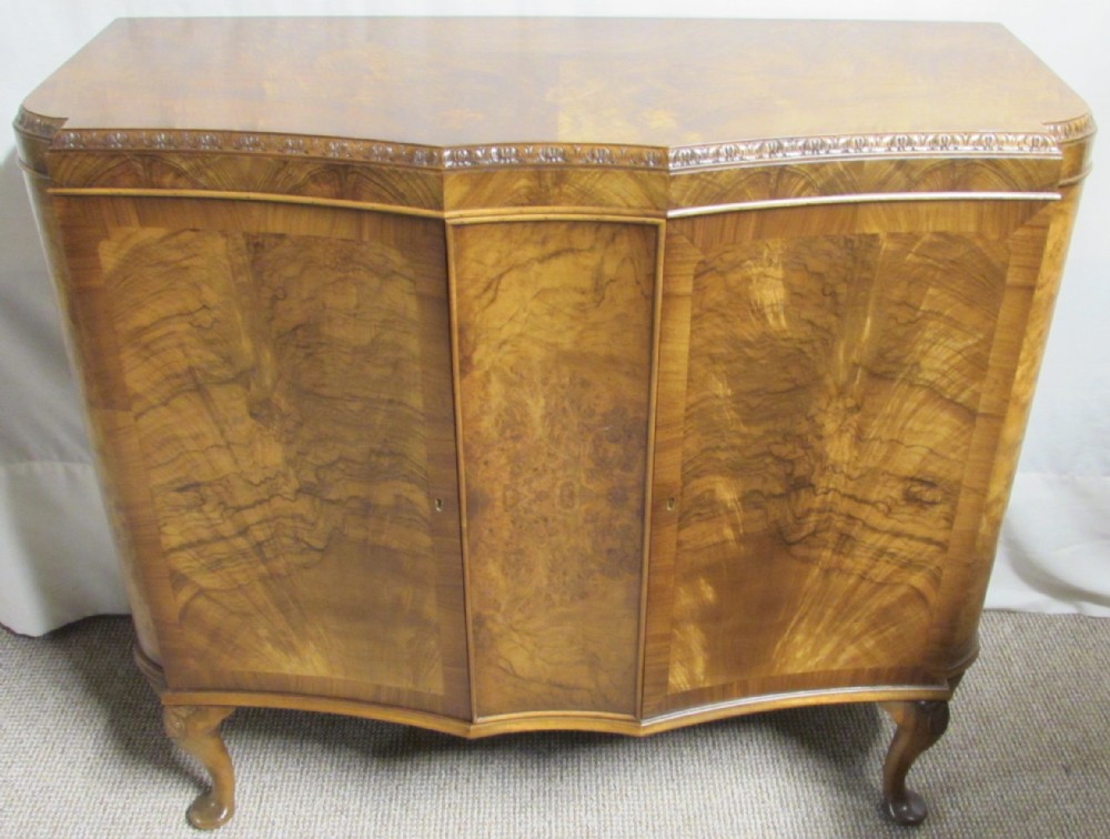 Burr Walnut Serpentine Shape cupboard