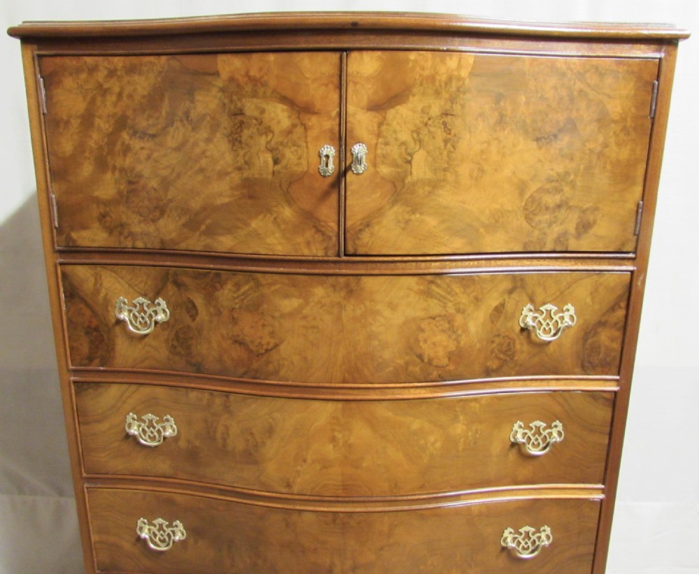 Burr Walnut Serpentine Chest of Drawers with Cupboard Over. View IV