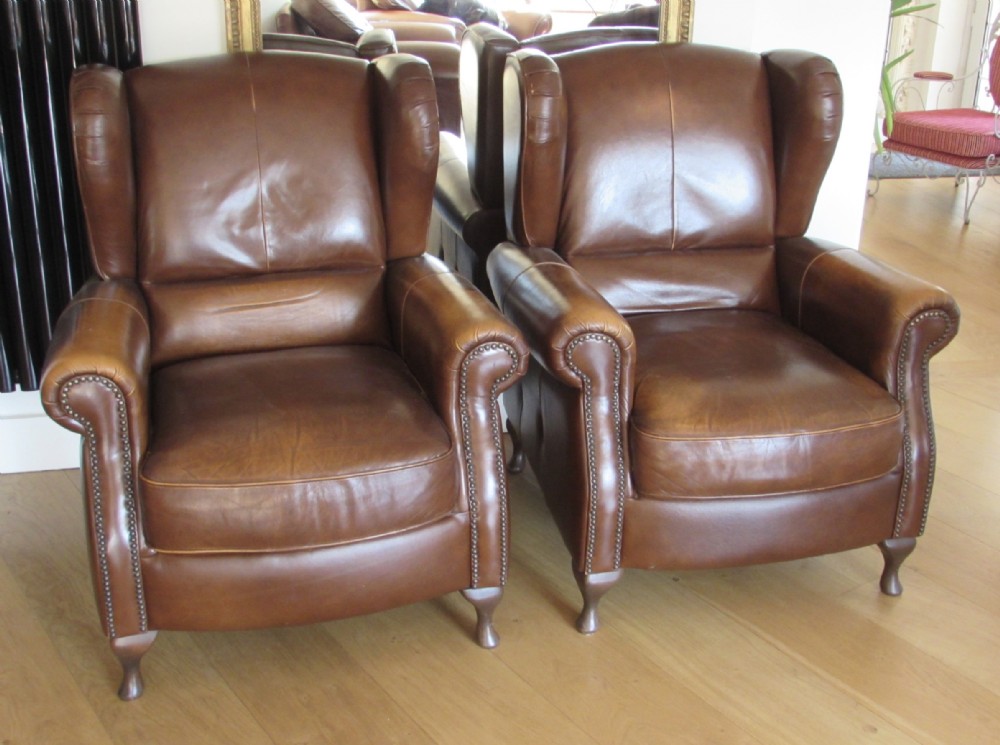 Pair Leather Wing Arm Club Chairs