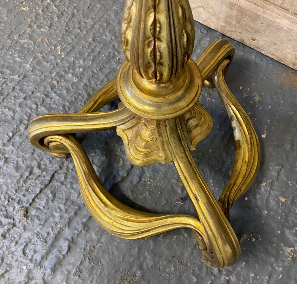 A French brass standard lamp featuring a fluted column shaft, scroll tripod base, and a white opal glass shade. View III