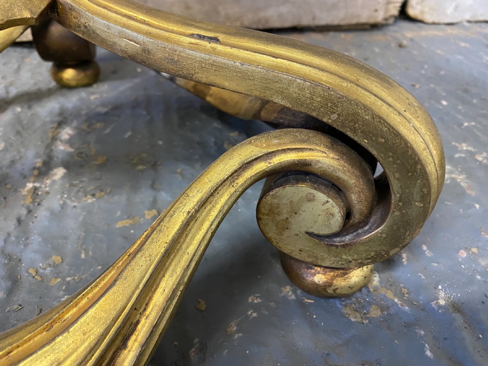 A French brass standard lamp featuring a fluted column shaft, scroll tripod base, and a white opal glass shade. View X