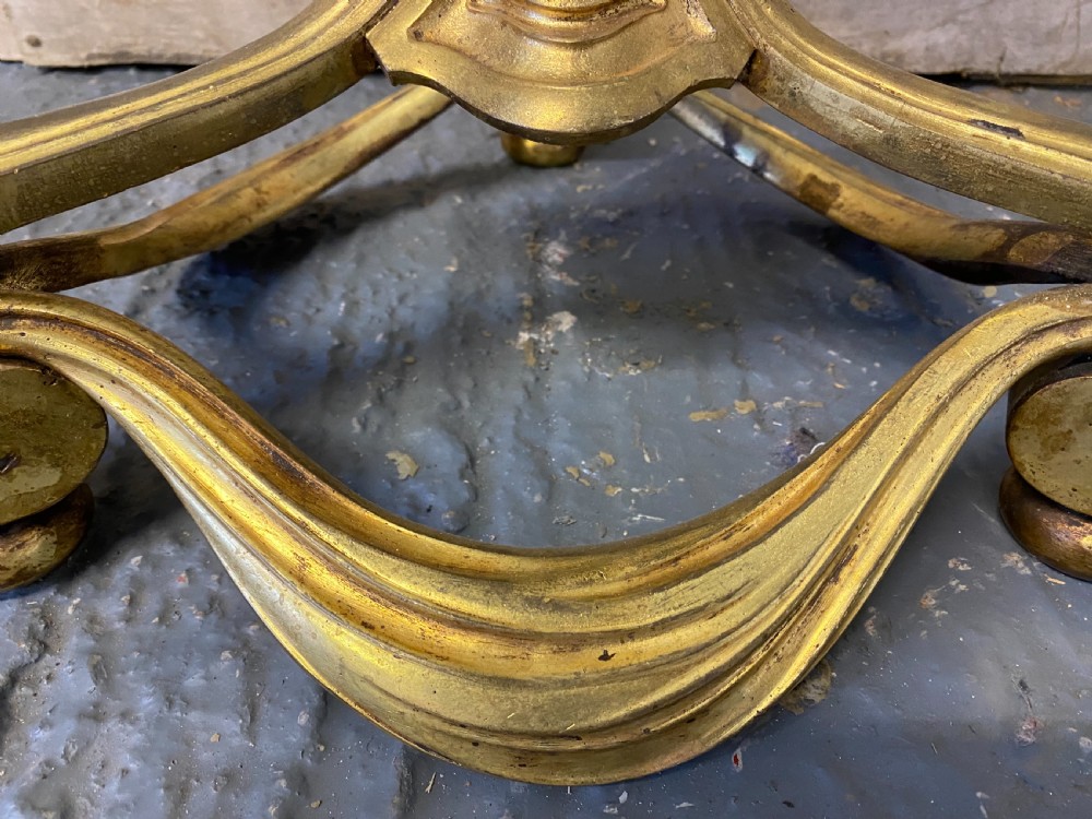 A French brass standard lamp featuring a fluted column shaft, scroll tripod base, and a white opal glass shade. View XIII