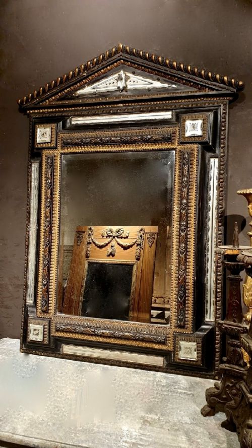 A Mid C19th French Ebonised & Gilt Murano Mirror