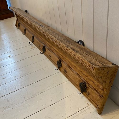 A Large Antique French Oak Coat Rack with Shelf