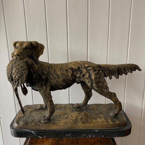 A Bronze Sculpture of a Gun Dog with Pheasant on a Marble Base