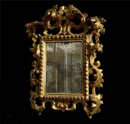 A Small Antique Florentine Giltwood Mirror