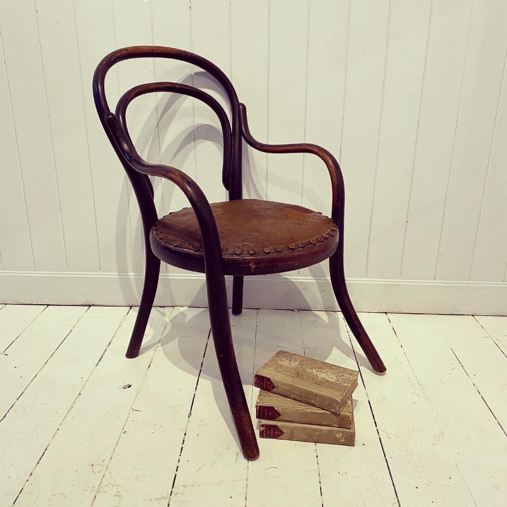 A Vintage Childs Bentwood and Leather Armchair