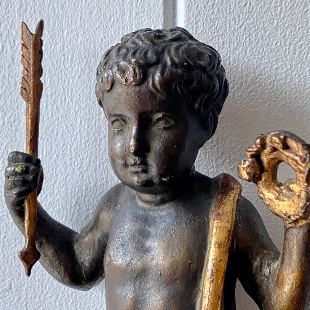 Small C19th Carved Painted and Gilded Putti View II