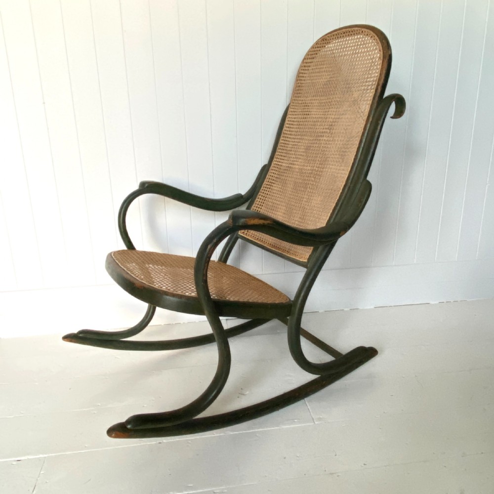 A Thonet Painted Bentwood and Cane Rocking Chair